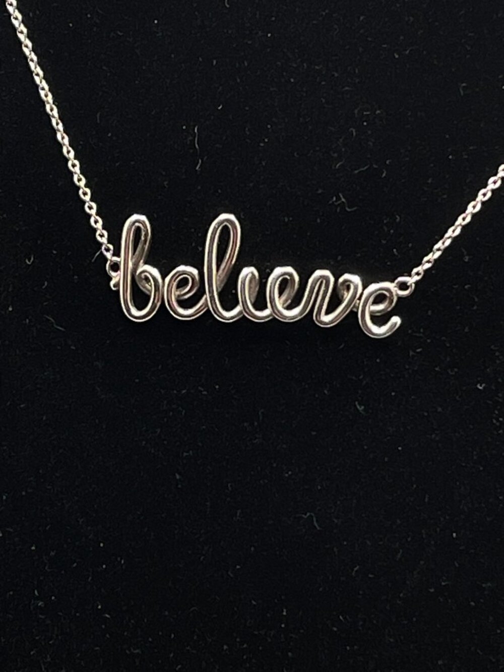 People's Cursive Sterling "Believe" Necklace.